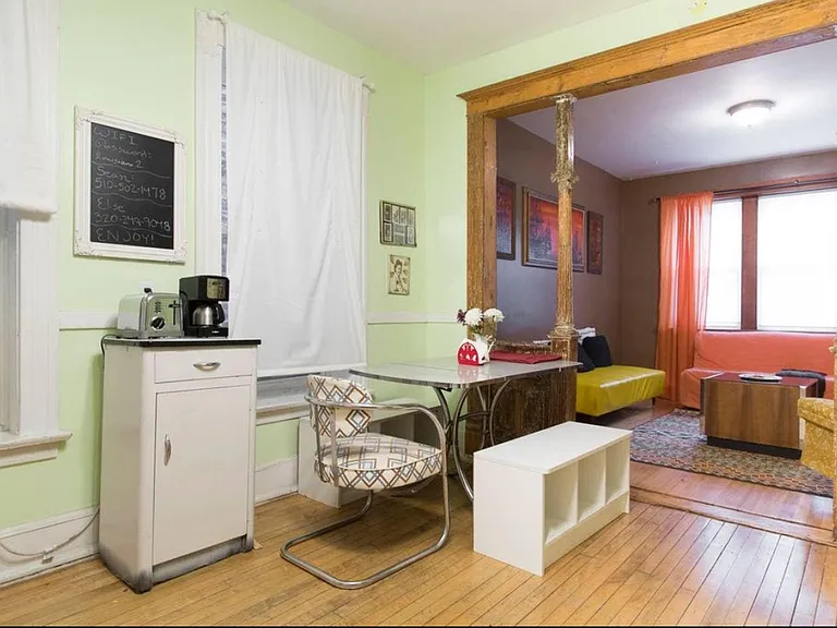 staged photo of living room - room has since been painted / renovated