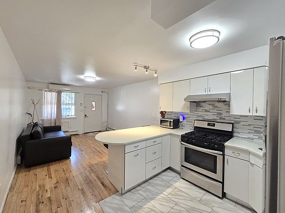 2nd image of 8620 Bay 16 St #1