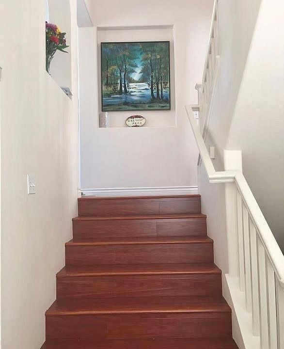 Front door entry - stairs to kitchen and living room