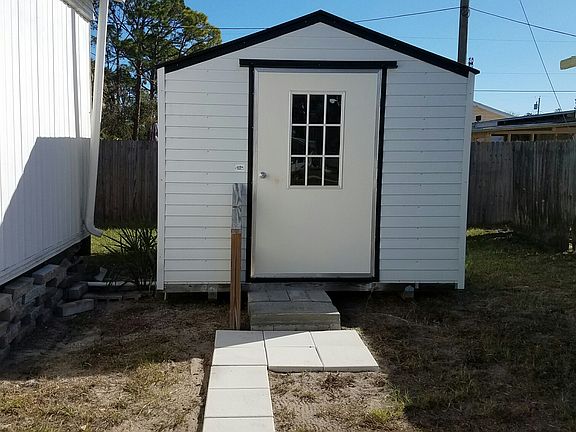 Utility Shed for storage and washer dryer
