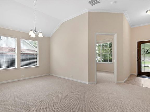 Formal Dining Room. The room the the right can be an office or study