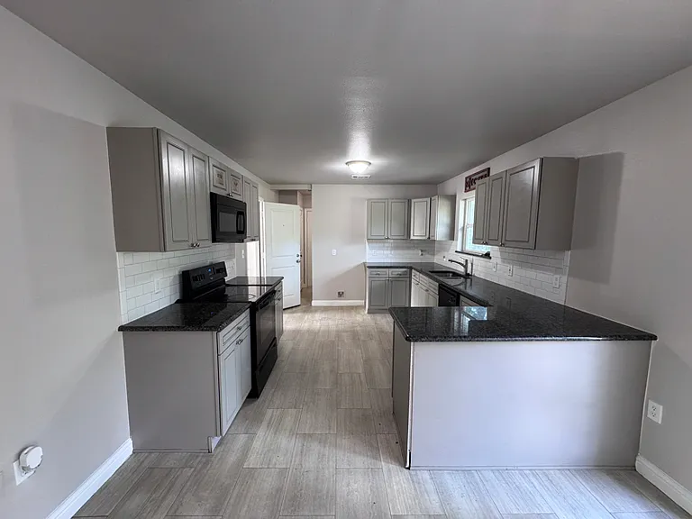 Photo from a previous listing. Tenant is currently occupying the Home.