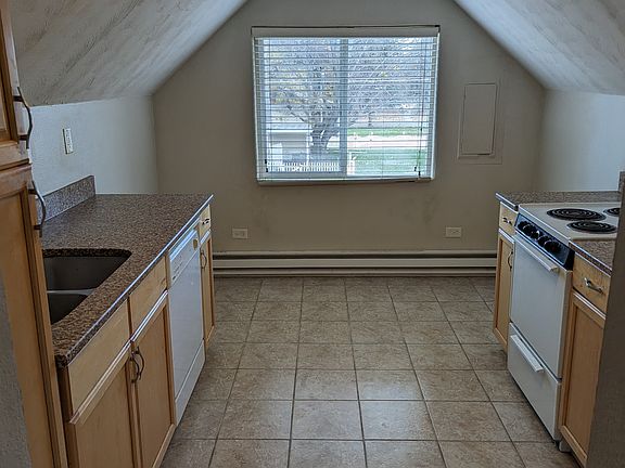 Galley kitchen with room for a table.