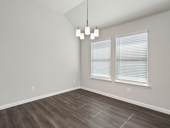 Dining room in the Quartz home plan by Trophy Signature Homes - REPRESENTATIVE PHOTO