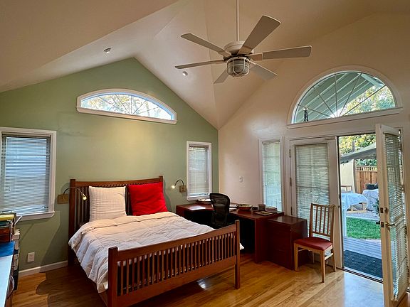 Master Suite w queen bed, desk, cabinets