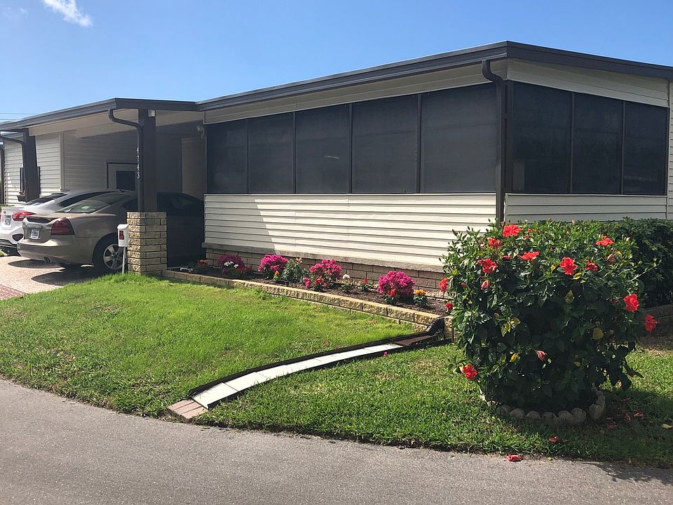 FRONT VIEW WITH LANDSCAPING