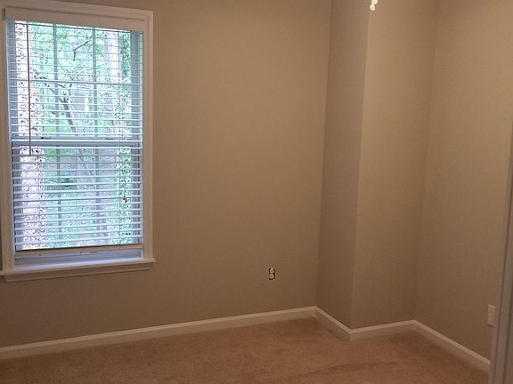 Bedroom #3 with closet organizers and ceiling fans