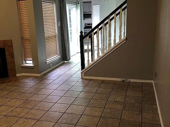 Living room looking into kitchen