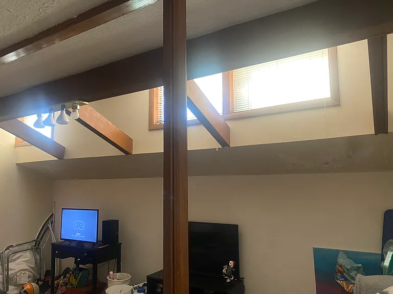 Upstairs bonus room can be a bedroom or office with skylights and 1/2 bath