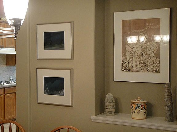 Art niche in formal dining room.