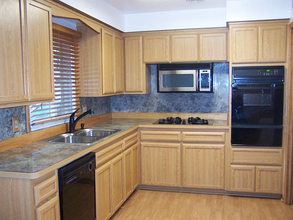 Large updated kitchen with built-in appliances
