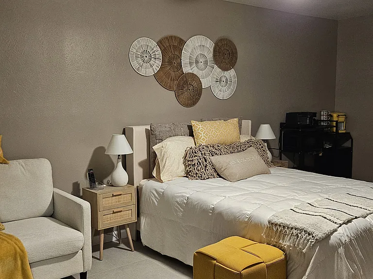 Queen size bed, 2 night stands with USB charger station.