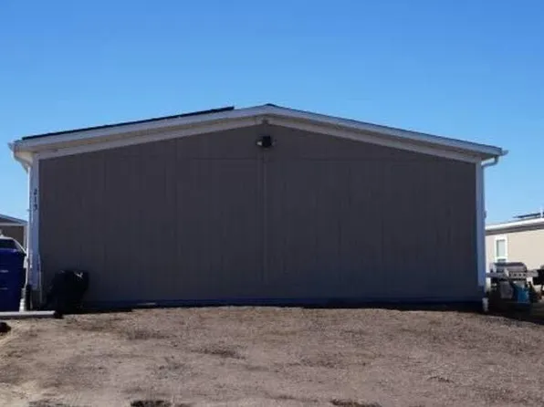 215 Larch Dr, Log Lane Village, CO 80705