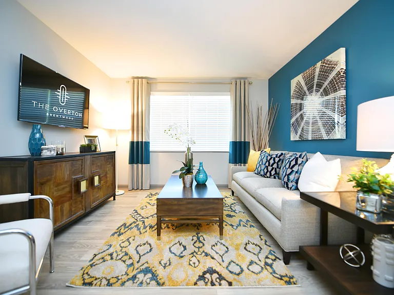 Spacious living room with hardwood-style flooring