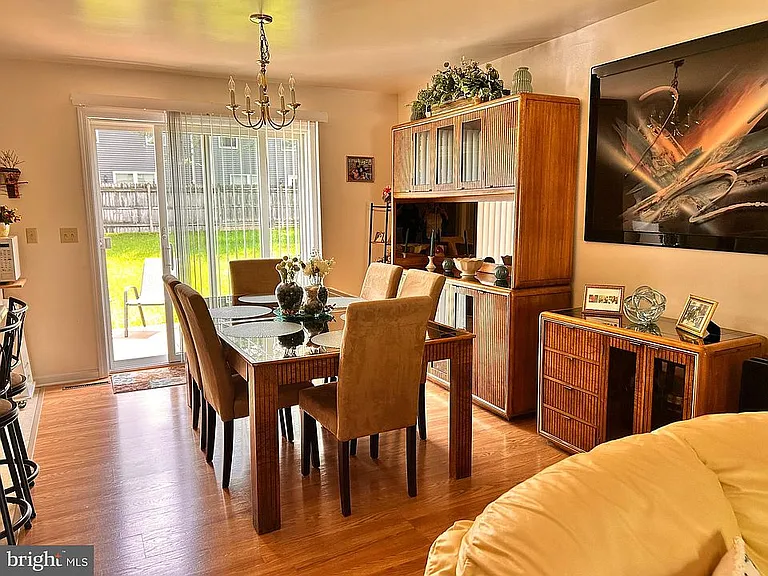 Dining area with a view of the backyard.