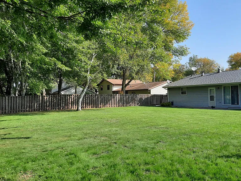 Backyard (wood fence was replaced with chain-link fence)