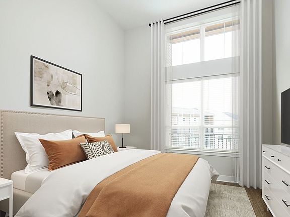 Signature Collection bedroom with hard surface flooring