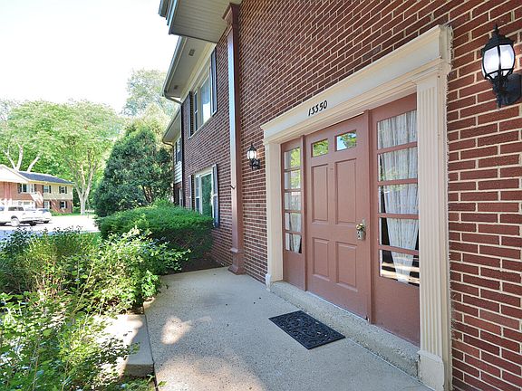 Front Entrance into Building 13350
Unit 1 is lower left with exterior brick all the way around (front, side, and back)