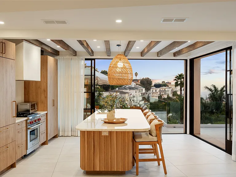 Fleetwood doors let you transition from cozy interiors to scenic patios.