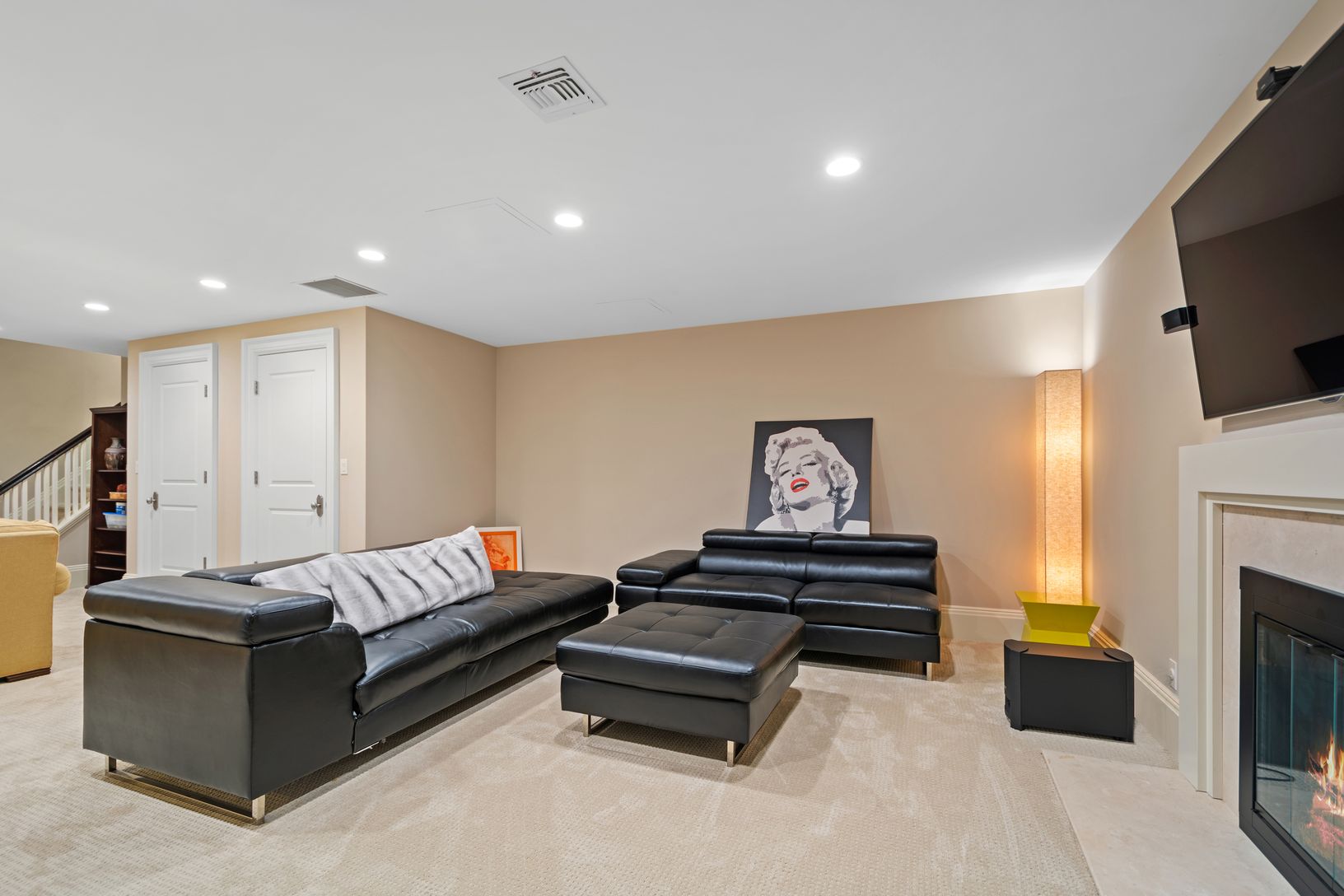  Lower level media area with fireplace