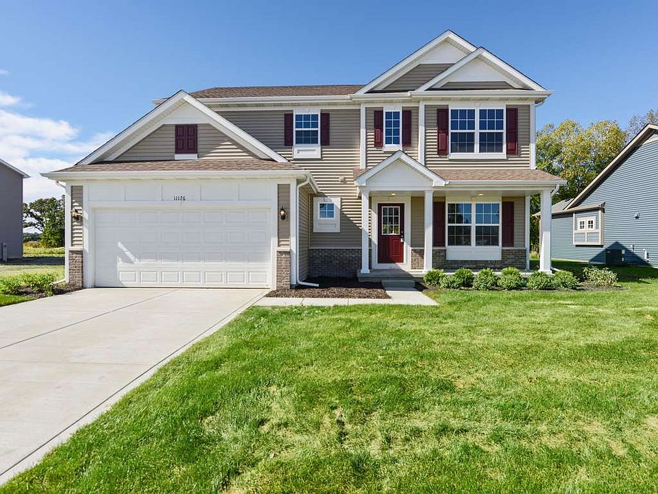Situated on a tranquil, wooded pond lot.
