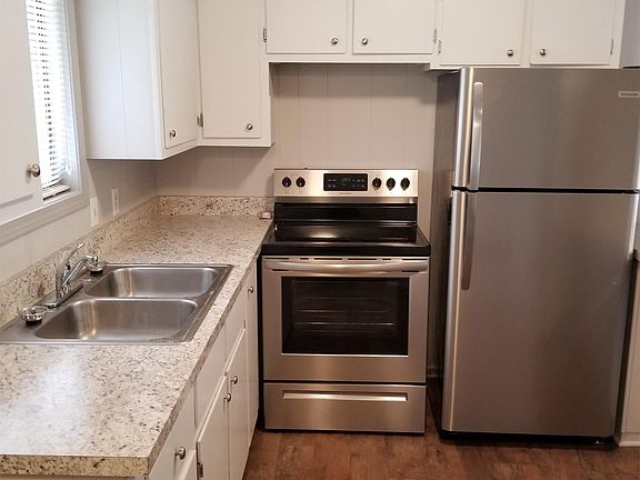 Newly renovated kitchen with stainless steel appliances.