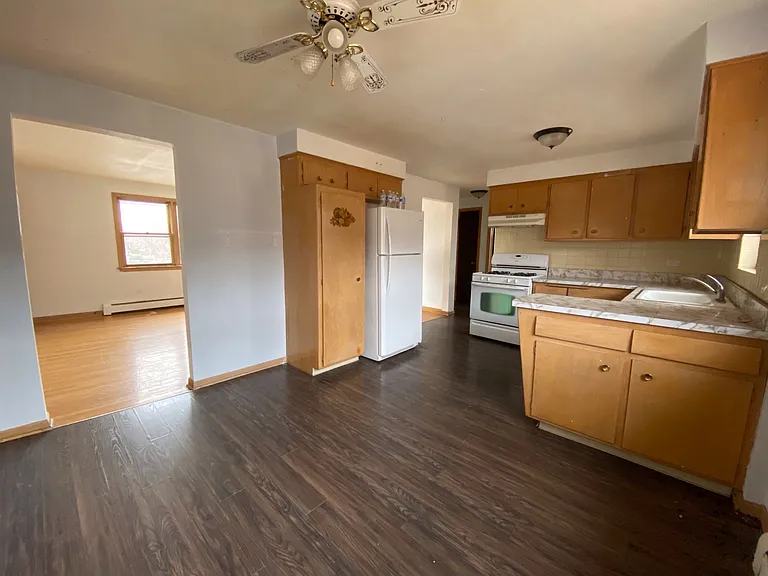 3 West kitchen. The kitchen has a breakfast bar for additional counterspace.