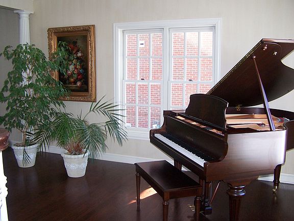 Sunny living room with hardwood floors