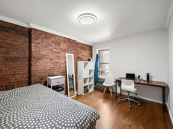 2nd image of 237 E 2nd St APT 2B