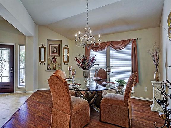 You will enter the home into the foyer through the leaded glass front door. Foyer has ceramic tile floors. Floors in dining room are at an angle for much more interesting architecture.