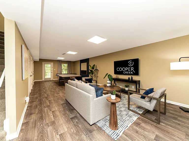 Spacious living room with hardwood-style flooring