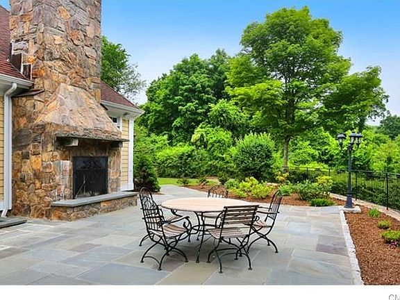 Exterior fireplace just outside the family room.  Enjoy the beautiful vistas and stay warm on the chilly nights