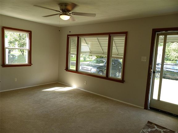 New stainless ceiling fan with light kit in living room