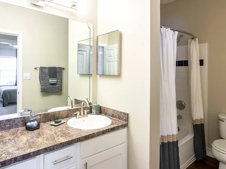 Bathroom with Large Vanity and Tub