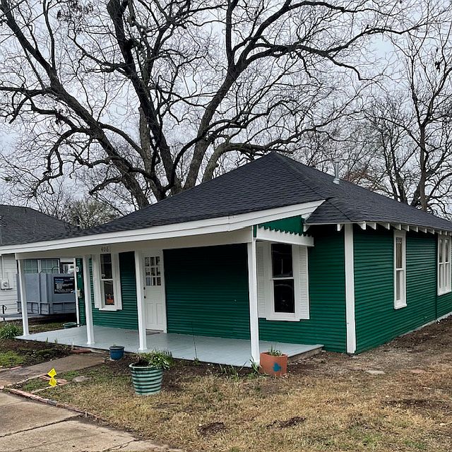 Front and right side view of house
