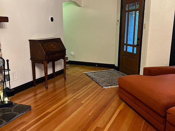 hallway to bedrooms and upstairs