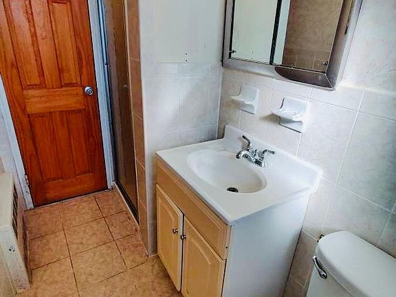 3rd image of 5856 78th St Floor 1