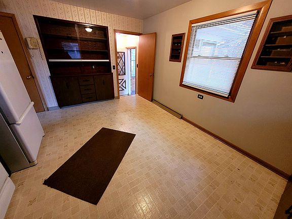 Kitchen with storage / display built ins