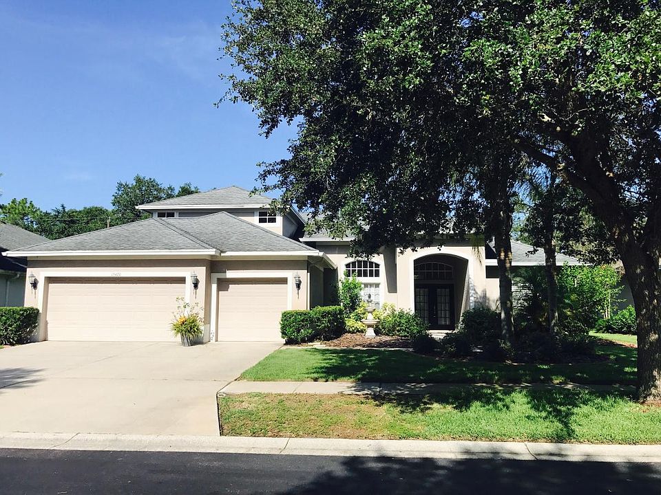 Curb appeal abounds in this sought after gated community