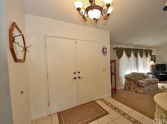 Entry opens to the formal living room