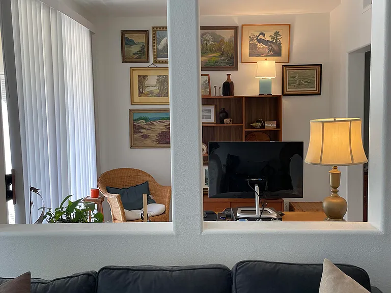 We added a bookcase/wall unit in the bonus room, so the images of that wall are slightly different in some of the pictures.