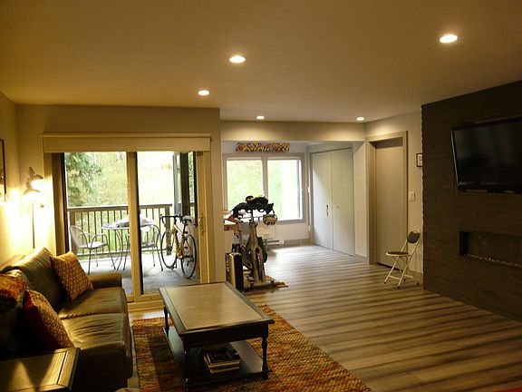 Living room complete with fire place and t.v.