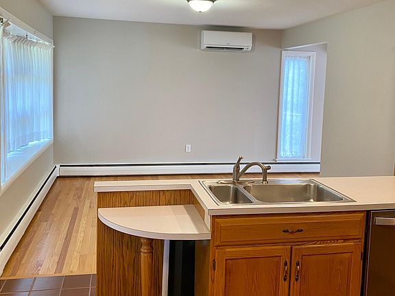 Kitchen opens to large dining area