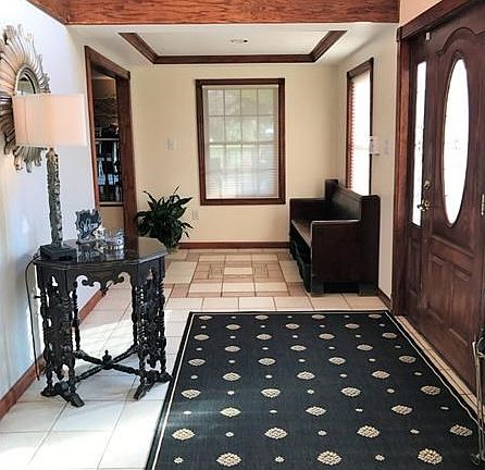 LARGE CERAMIC FOYER-OPEN CEILING TO 2ND FLOOR