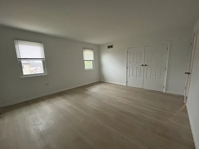 Large Main Bedroom has closet with double doors