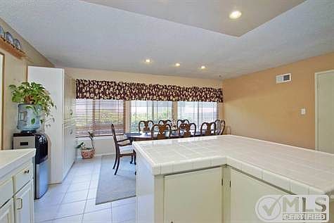 Another view of kitchen facing the large dining area.