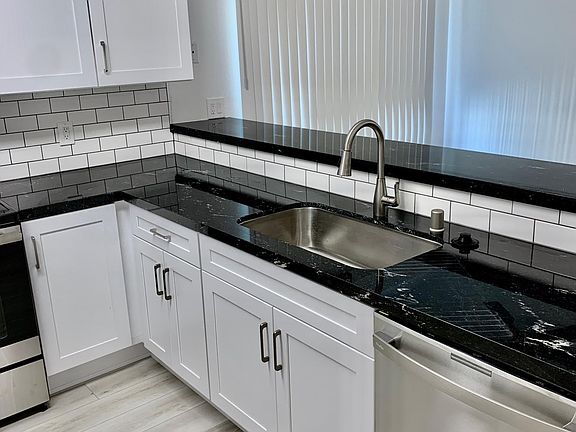 Kitchen. Looking into dining room.