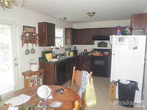 Large eat-in kitchen with plenty of cabinet and counter space