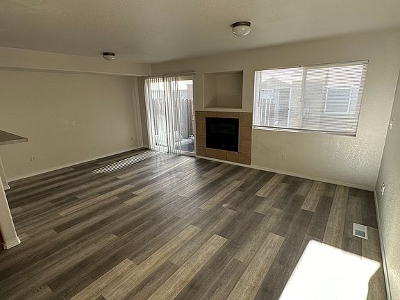 BRAND NEW FLOORING! Large Eating area and family room. Brand new sliding door blinds and window blinds installed. BBQ on private porch is included
 3 propane tanks are ready for you to cook!