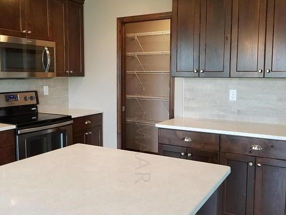 Kitchen with walk-in pantry